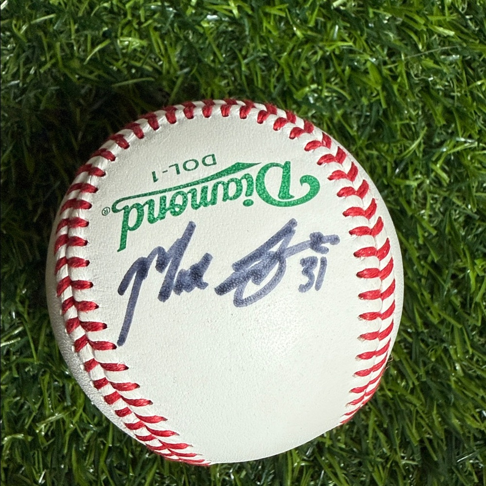 White and Red Baseball with Green Logo